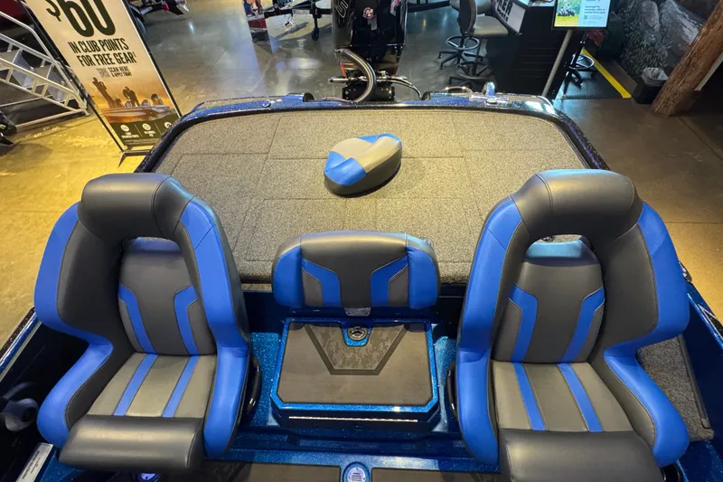 Slide: The Image of 2025 Nitro Z20 XL Pro boat interior with blue and gray seating. - 6