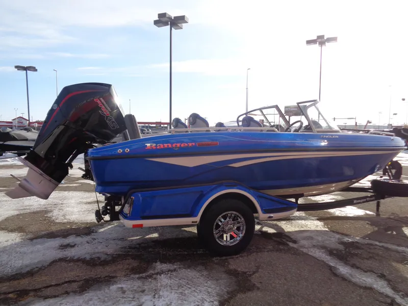 Slide: The Image of 2024 Ranger 1880MS boat in blue, parked on a snowy lot. - 4