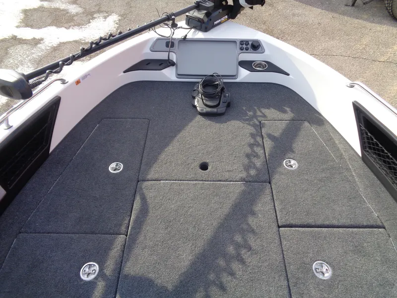 Slide: The Image of 2024 Ranger 1880MS boat deck with advanced navigation system and storage compartments. - 8