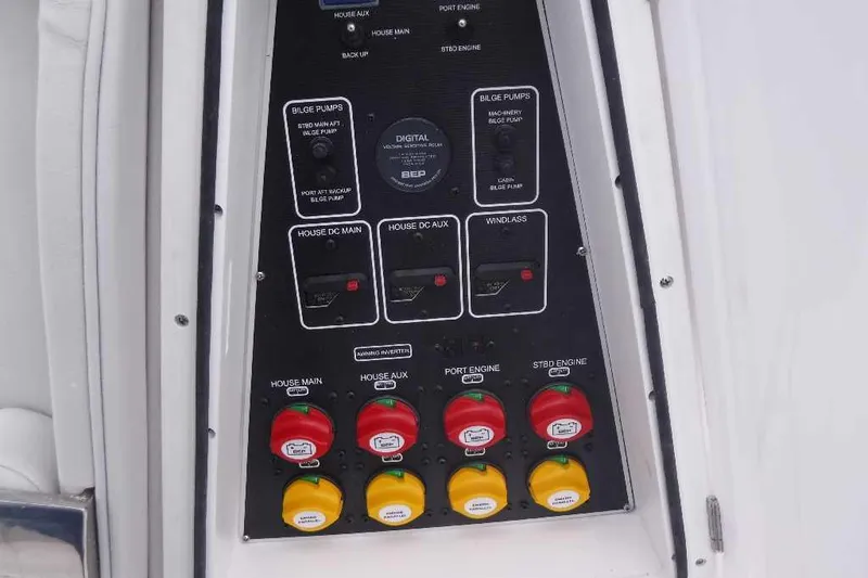 Slide: The Image of Control panel of a 2020 Sea Fox 368 Commander boat with labeled switches and buttons. - 13