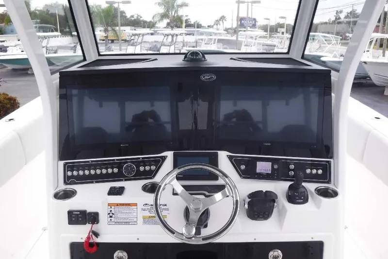 Slide: The Image of 2020 Sea Fox 368 Commander helm with modern controls and navigation displays. - 16