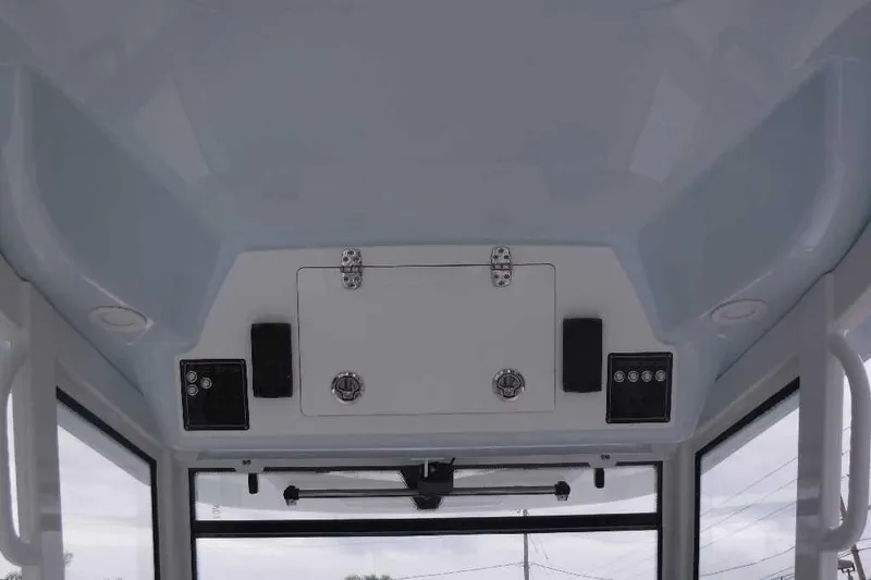 Slide: The Image of Interior view of 2020 Sea Fox 368 Commander boat ceiling with storage compartment. - 17