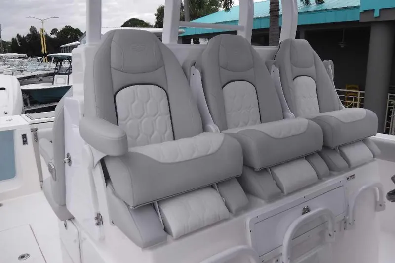 Slide: The Image of 2020 Sea Fox 368 Commander boat with three luxurious gray seats. - 19