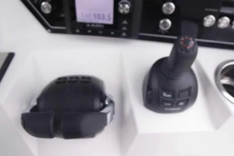 Slide: The Image of Control panel of a 2020 Sea Fox 368 Commander boat with joystick and throttle. - 20