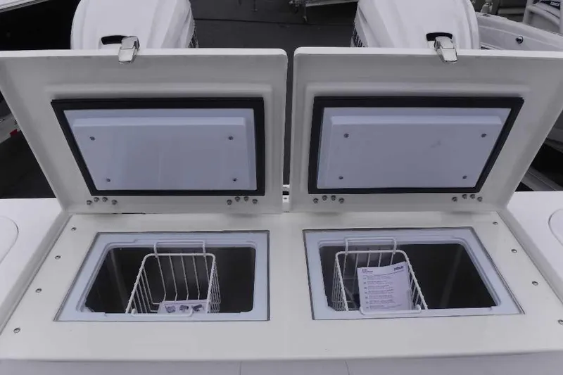 Slide: The Image of Open storage compartments on a 2020 Sea Fox 368 Commander boat. - 3