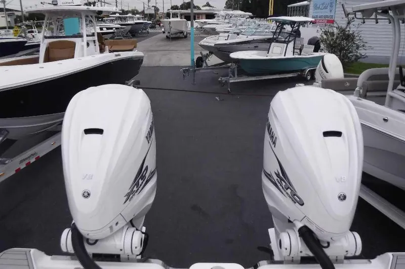 Slide: The Image of Sea Fox 368 Commander 2020 with Yamaha outboard engines at a boat dealership. - 5