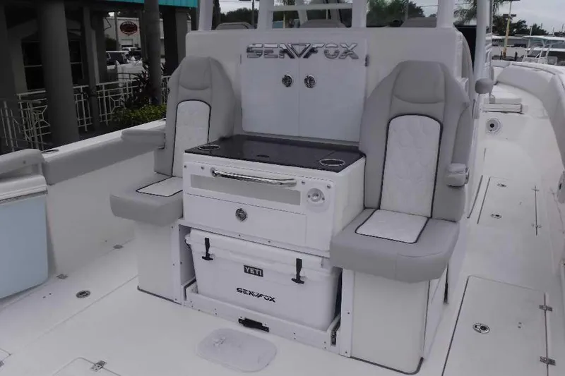 Slide: The Image of 2020 Sea Fox 368 Commander boat interior with seating and storage. - 6