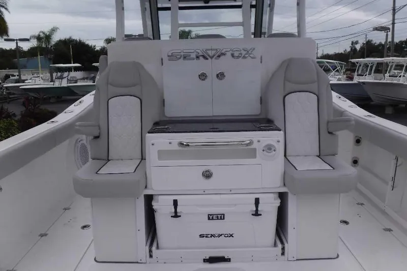 Slide: The Image of 2020 Sea Fox 368 Commander boat interior with seating and storage. - 7