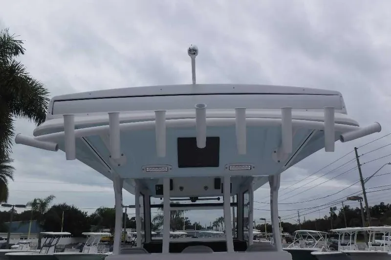 Slide: The Image of 2020 Sea Fox 368 Commander boat with rod holders and canopy, viewed from below. - 8