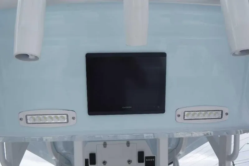 Slide: The Image of 2020 Sea Fox 368 Commander dashboard with Garmin display and LED lights. - 9