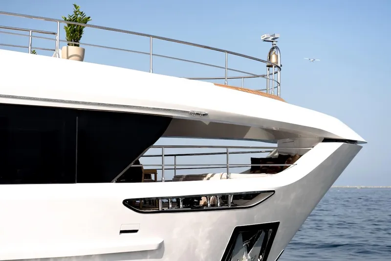 Slide: The Image of Luxury Majesty 100 Terrace yacht, 2025 model, sleek design on open sea. - 14