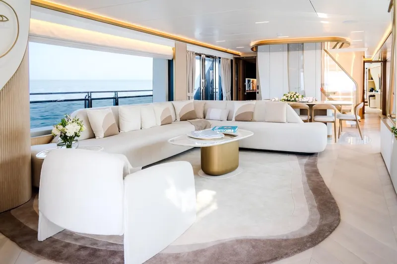 Slide: The Image of Luxurious interior of 2025 Majesty 100 Terrace yacht with elegant seating and ocean view. - 25