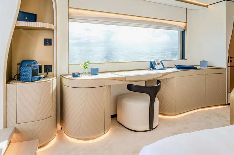 Slide: The Image of Luxurious interior of 2025 Majesty 100 Terrace yacht with elegant furnishings and ocean view. - 29