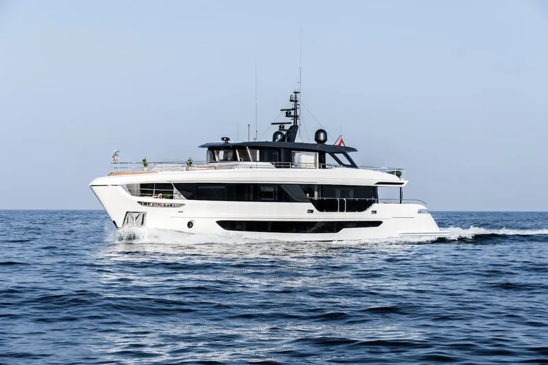 Slide: The Image of Majesty 100 Terrace yacht cruising on open sea, 2025 model. - 3