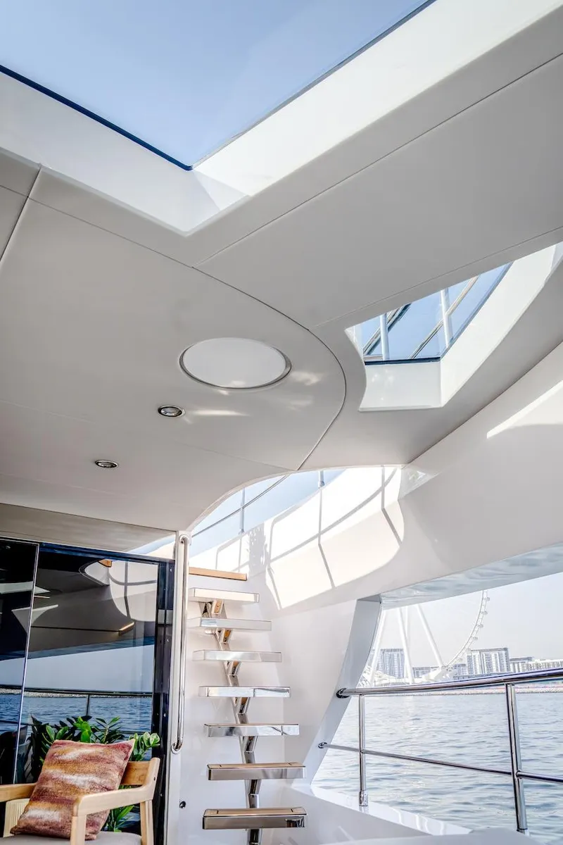 Slide: The Image of Luxurious Majesty 100 Terrace yacht interior, featuring modern design and panoramic views, 2025 model. - 32