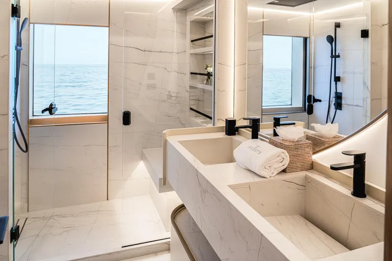 Slide: The Image of Luxurious bathroom in 2025 Majesty 100 Terrace yacht with ocean view and modern fixtures. - 36