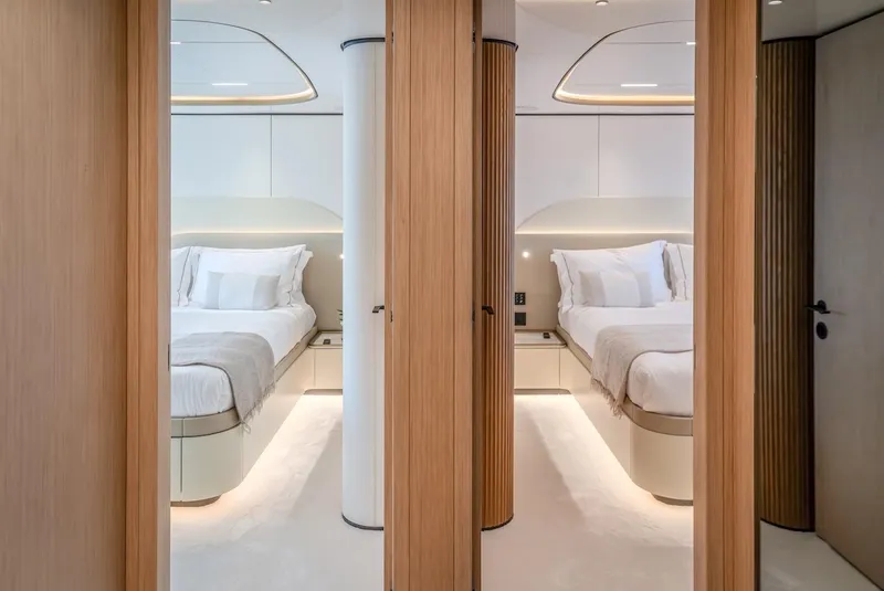 Slide: The Image of Luxurious bedroom interior on 2025 Majesty 100 Terrace yacht, featuring modern design and elegant furnishings. - 37