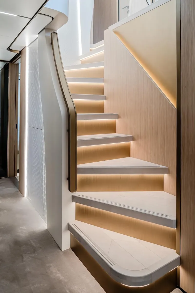 Slide: The Image of Modern staircase with ambient lighting in 2025 Majesty 100 Terrace yacht. - 41