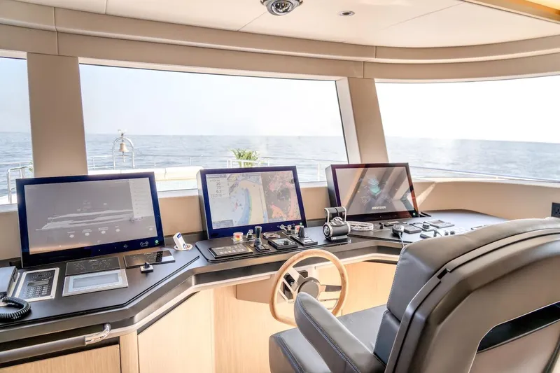Slide: The Image of Modern helm of 2025 Majesty 100 Terrace yacht with advanced navigation systems. - 47