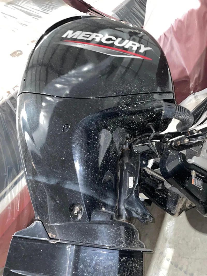 Slide: The Image of Mercury outboard motor on a 2021 Tahoe 550 TS boat. - 10