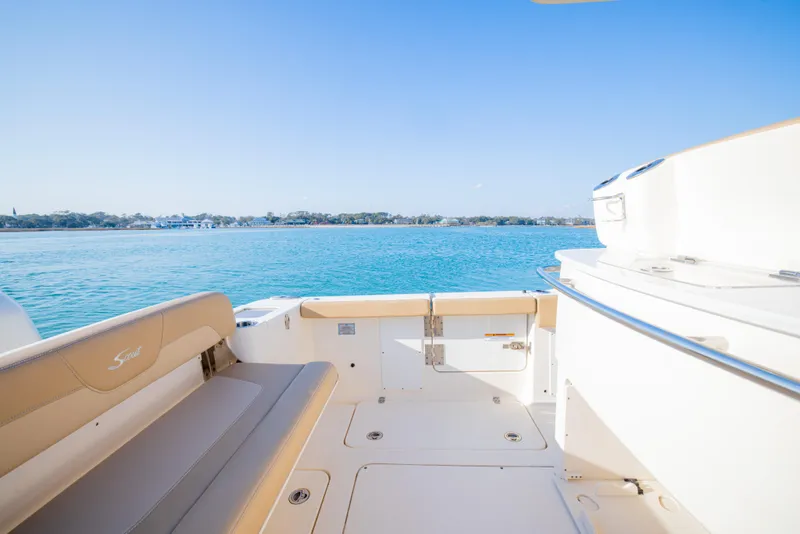 Slide: The Image of 2021 Scout 277 LXF boat interior with scenic ocean view. - 26