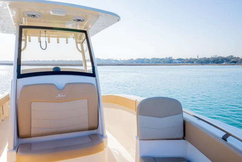 Slide: The Image of 2021 Scout 277 LXF boat interior with scenic water view. - 44