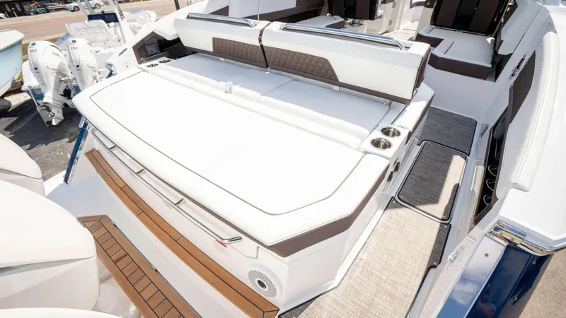 Slide: The Image of Luxurious 2025 Cobalt R33 boat interior with plush seating and modern design. - 11