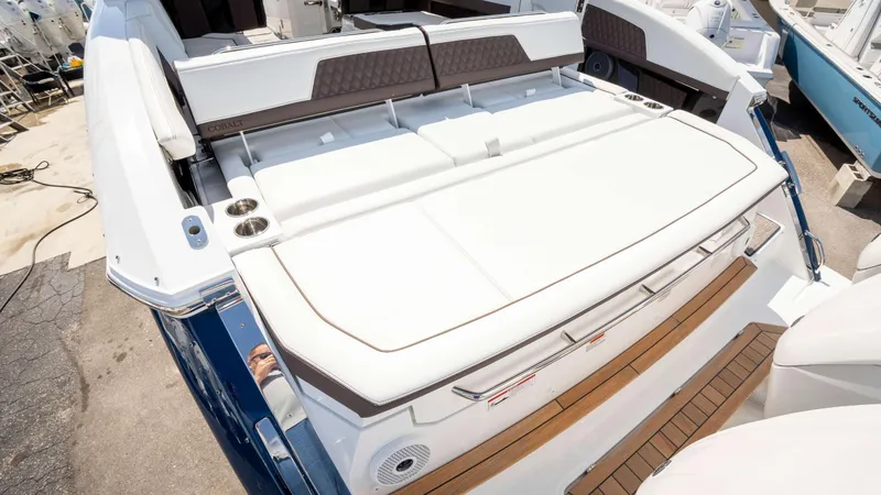 Slide: The Image of 2025 Cobalt R33 boat with spacious sun deck and sleek design. - 12