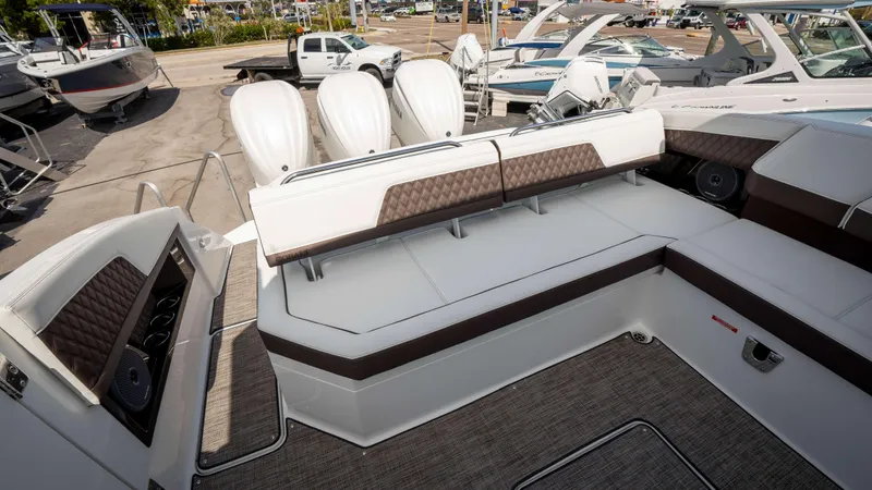 Slide: The Image of Luxurious seating area on 2025 Cobalt R33 boat, featuring elegant upholstery and spacious design. - 16