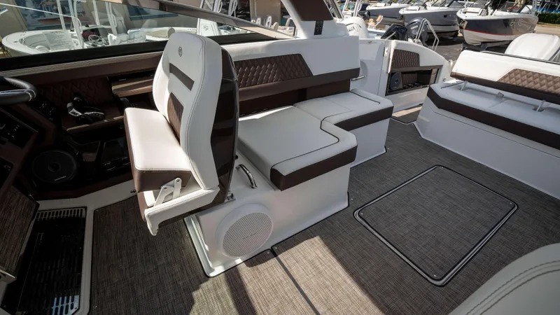 Slide: The Image of Interior of 2025 Cobalt R33 boat with luxurious seating and modern design. - 21