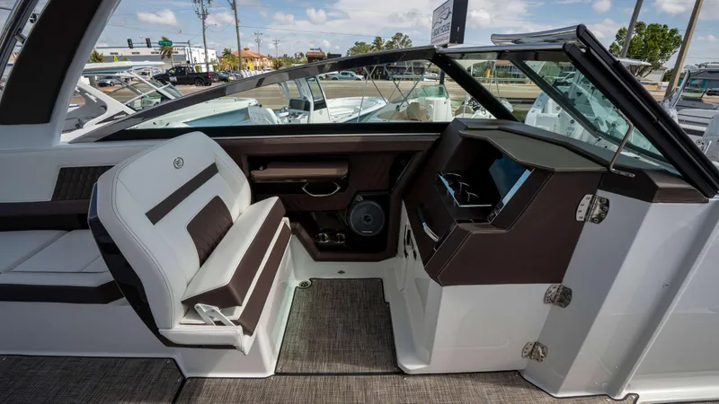 Slide: The Image of Interior of 2025 Cobalt R33 boat, featuring sleek seating and modern dashboard design. - 23