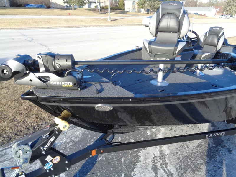Slide: The Image of 2025 Lund 1650 Angler SS boat with Minn Kota trolling motor on trailer. - 3
