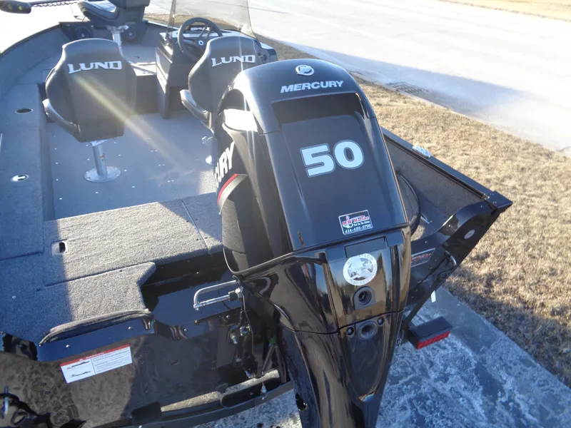 Slide: The Image of 2025 Lund 1650 Angler SS boat with Mercury 50 HP engine, featuring dual Lund seats. - 6