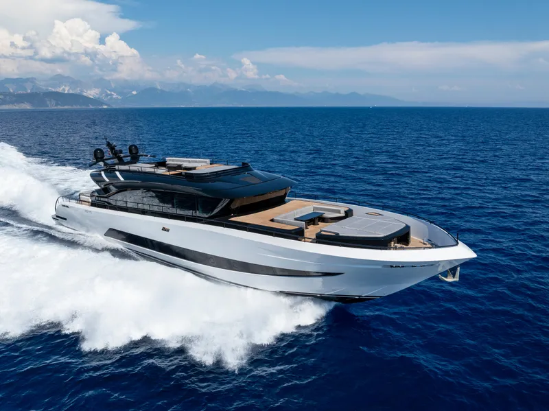 Slide: The Image of Luxurious 2026 AB 110 yacht cruising on open sea under clear skies. - 1