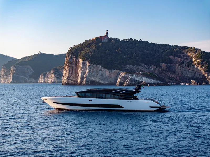 Slide: The Image of Luxurious 2026 AB 110 yacht cruising near scenic rocky coastline. - 6