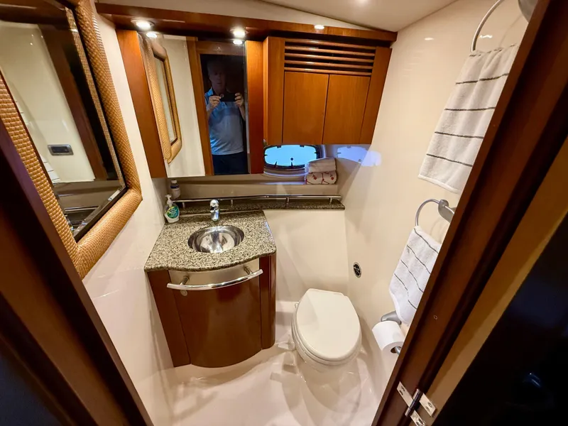 Slide: The Image of Luxurious bathroom in 2006 Sea Ray 48 Sundancer yacht with modern amenities. - 10
