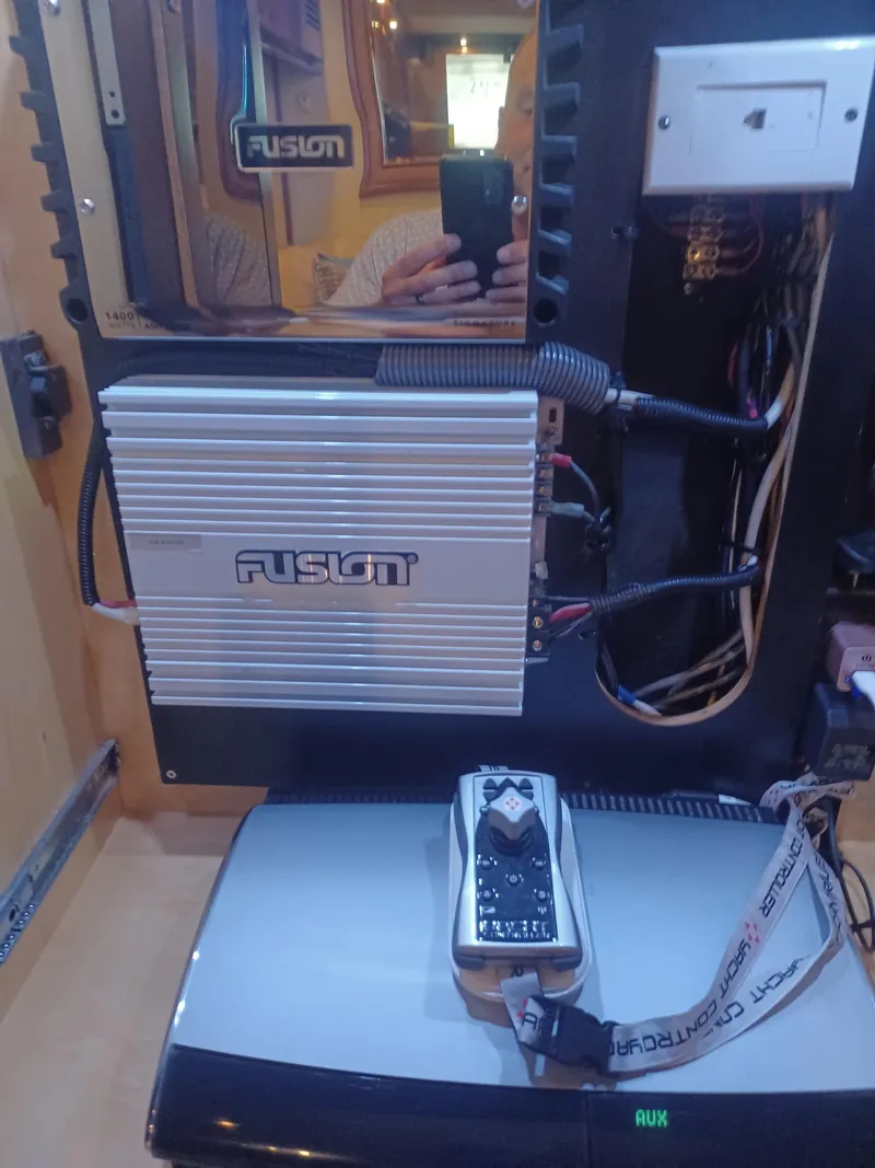 Slide: The Image of Audio system setup inside a 2006 Sea Ray 48 Sundancer yacht. - 26