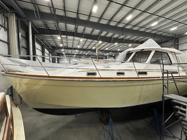 Slide: The Image of 2004 Sabre 42 Express Hardtop yacht in indoor storage facility. - 14