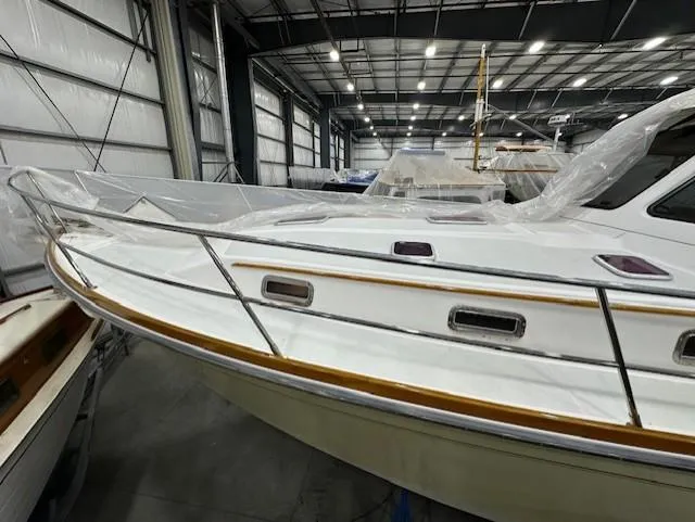 Slide: The Image of 2004 Sabre 42 Express Hardtop yacht in indoor storage facility. - 19