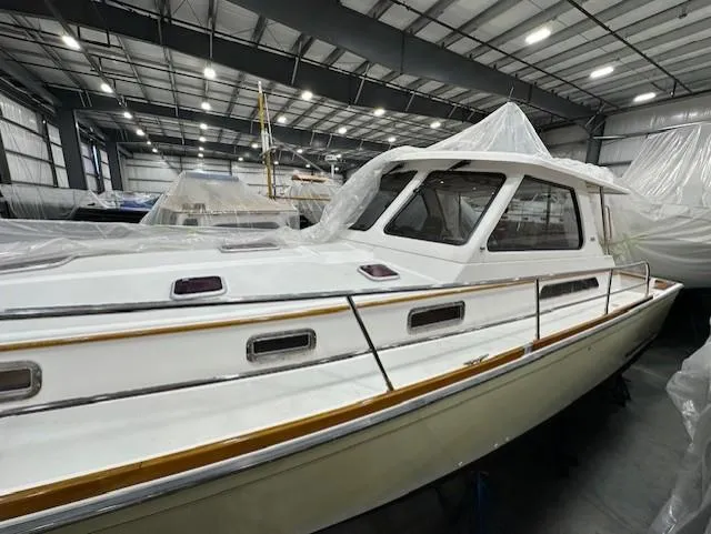 Slide: The Image of 2004 Sabre 42 Express Hardtop yacht in indoor storage facility. - 20