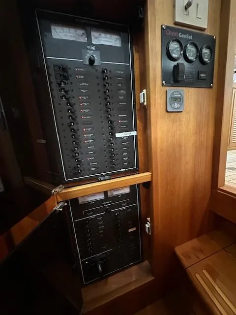 Slide: The Image of Electrical panel inside a 2004 Sabre 42 Express Hardtop boat. - 38