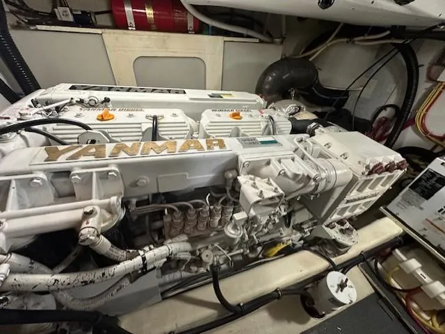 Slide: The Image of Yanmar engine in a 2004 Sabre 42 Express Hardtop boat engine room. - 53