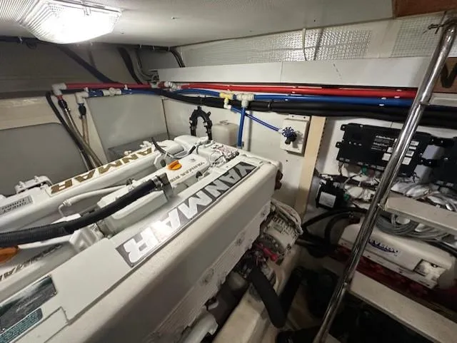 Slide: The Image of Engine room of 2004 Sabre 42 Express Hardtop with Yanmar engines and wiring. - 55