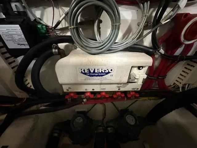 Slide: The Image of Engine room of 2004 Sabre 42 Express Hardtop with Reverso oil change system. - 59