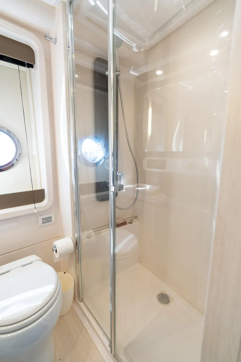 Slide: The Image of Modern bathroom with glass shower in 2020 Azimut 50 Flybridge yacht. - 18