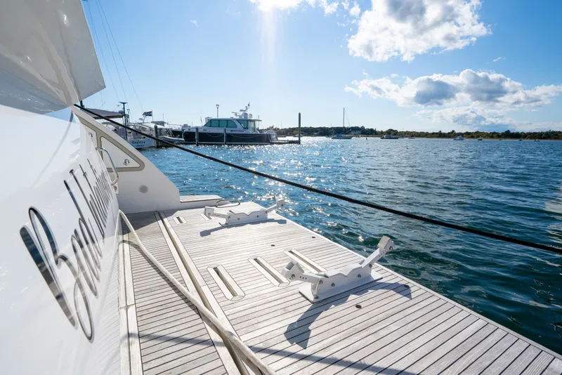Slide: The Image of Azimut 50 Flybridge 2020 yacht docked on a sunny day with scenic water view. - 32