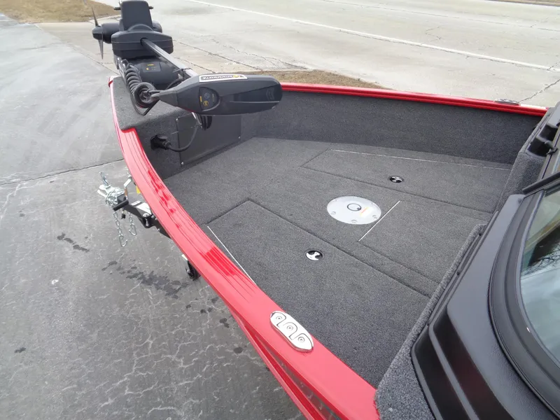 Slide: The Image of 2025 Lund 1775 Adventure Sport boat, red exterior, spacious deck, modern design. - 6