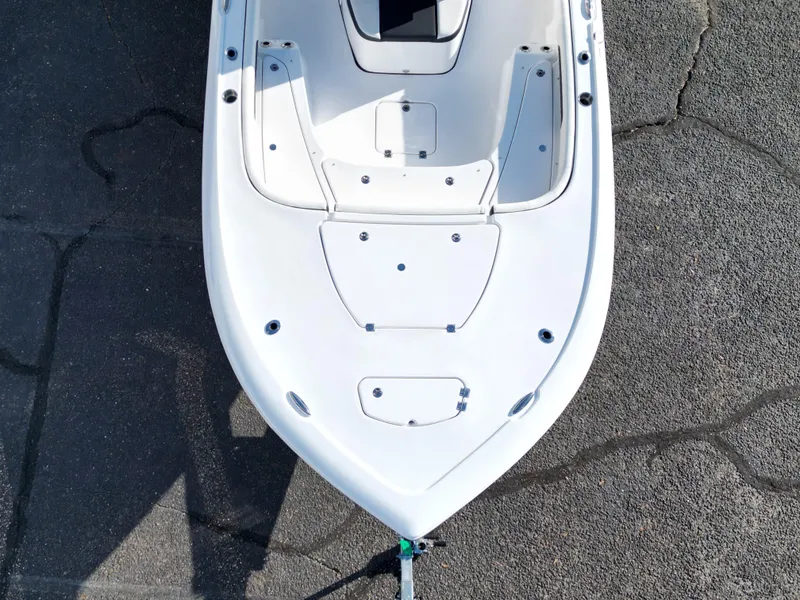 Slide: The Image of Top view of 2025 Tidewater 2500CB boat on pavement. - 13