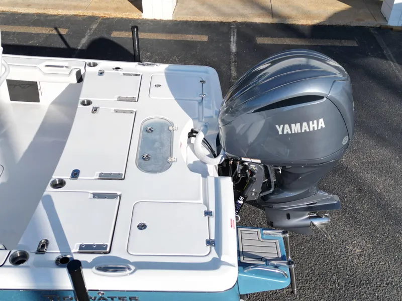 Slide: The Image of 2025 Tidewater 2500CB boat with Yamaha outboard motor, viewed from above. - 14