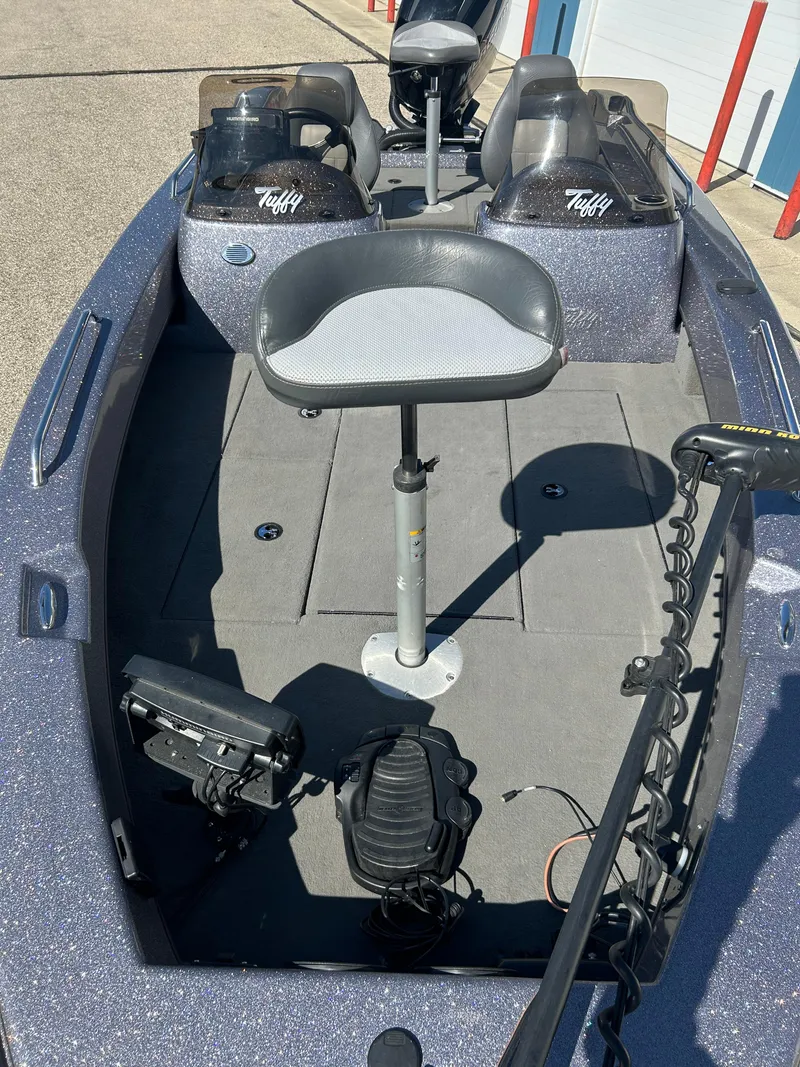 Slide: The Image of 2014 Tuffy 1760 Osprey fishing boat interior with seating and equipment. - 10